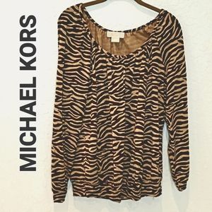 Michael Kors size M animal print long sleeve top with waistband and banded cuff